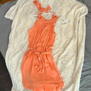 Naked Zebra medium open back romper